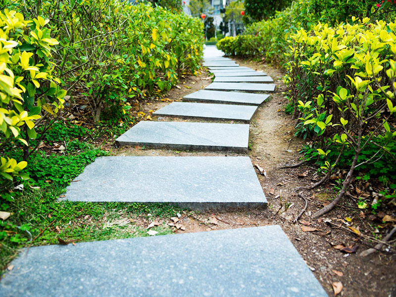 Lägga betongplattor